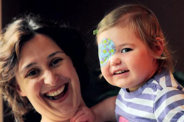 Vivian Wilson, then 2, with mother Meghan, needed medical marijuana and was one impetus behind the legalization of the edible form in New Jersey, but by then the family had moved to Colorado. (APRIL SAUL / File Photograph)