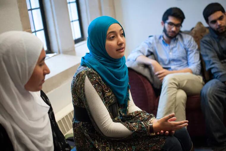 (From left) University of Pennsylvania students Du'aa Moharran, Lamis Elsawah, Zuhaib Badami and AbdelAziz Jalil, talk about their recent experiences as practicing Muslims after their Friday sermon at Houston
Hall on the University of Pennsylvania campus in Philadelphia, Pa. on Friday, Dec. 11, 2015.