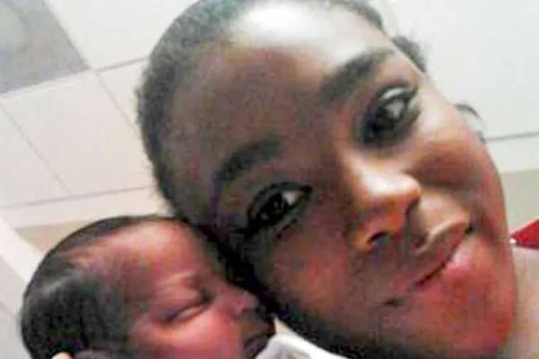 Jade Nelson, 22, with her newborn, Dillen Anthoney Whitest, who remains at Pennsylvania Hospital.