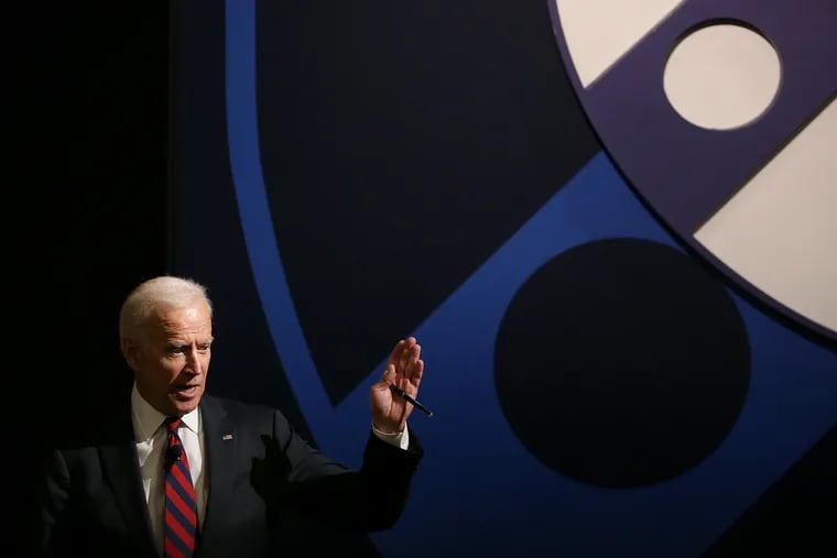 Former Vice President Joe Biden answers a submitted question at the University of Pennsylvania's Irvine Auditorium in Philadelphia on Tuesday, Feb. 19, 2019. Biden took a leave of absence from the school in April to run for president.