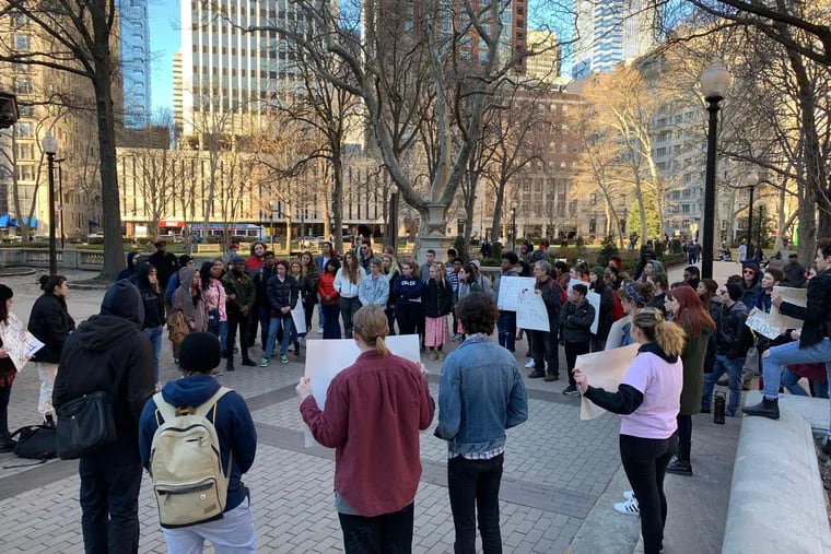 A group of nearly 100 protesters gathered in Rittenhouse Square Saturday afternoon to speak out against the trial of the former East Pittsburgh police officer who shot and killed 17-year-old Antwon Rose II last year.
