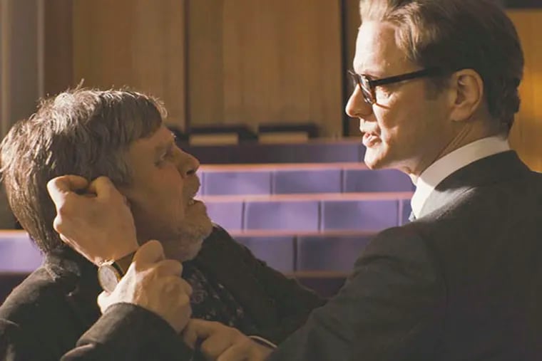 Colin Firth has Mark Hamill by the ear in a scene from "Kingsman: The Secret Service." (20th Century Fox)