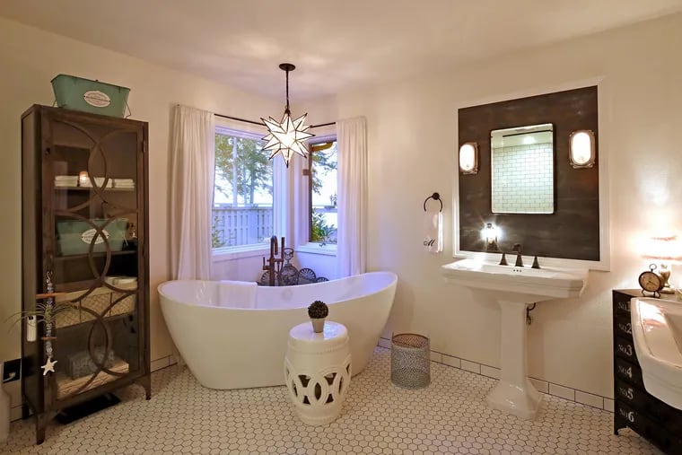 You could put an area rug in a bathroom this big, but make sure it's an outdoor rug so it can withstand getting wet. (Greg Gilbert/The Seattle Times/TNS)