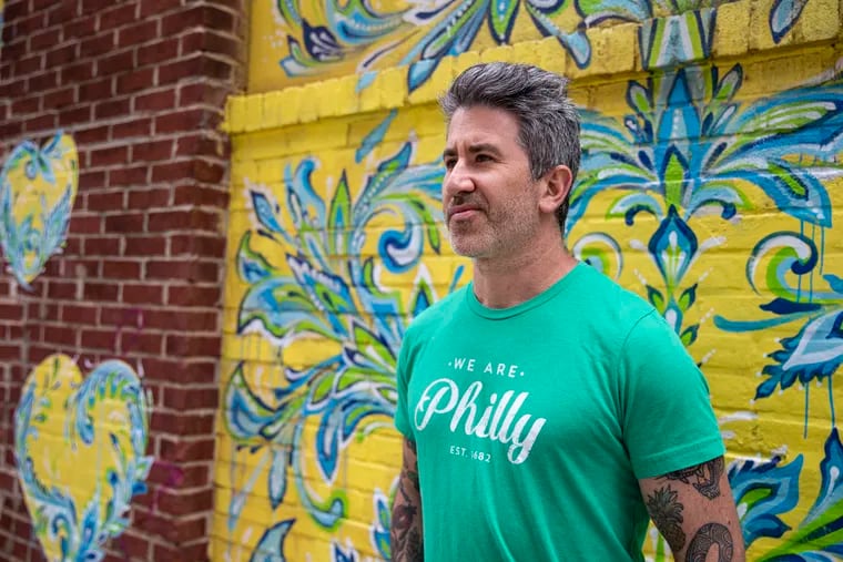 Mike Solomonov, co-owner of CookNSolo, poses for a portrait in 2021 outside the former Honeygrow headquarters where they will start their catering hall and event space.