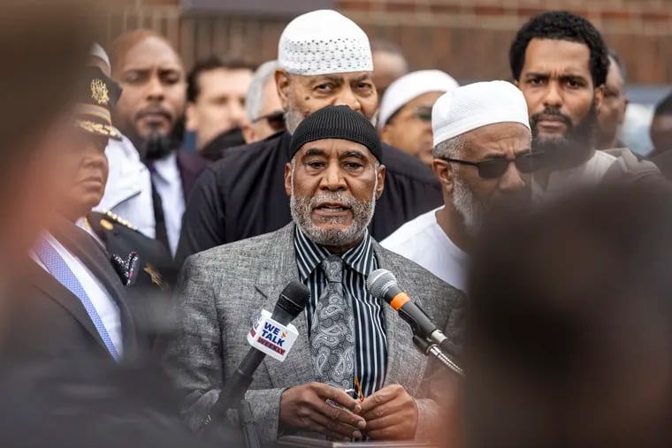Imam Saifullah Muhammad, business manager of operations at the Philadelphia Masjid, speaks in front of press and community members about the recent shooting at an Eid al-Fitr event that left three people injured.