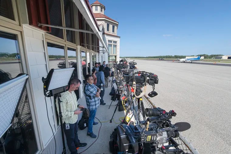 Members of the media line up for coverage of the arrival of immigrants at the Delaware Coastal Airport in Georgetown, Delaware. Tuesday, September 20, 2022.