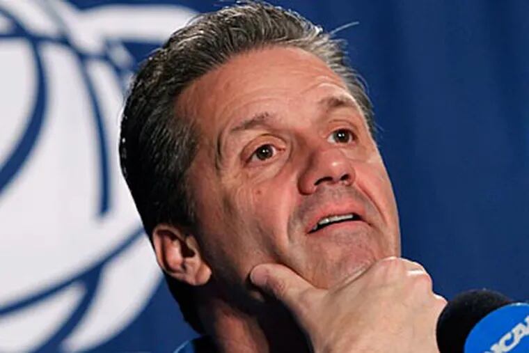Kentucky coach John Calipari answers questions at news conference on Saturday. (Mel Evans/AP Photo)
