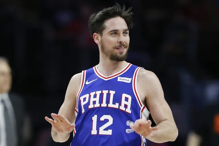 T.J. McConnell celebrates during the fourth quarter of the Sixers’ 108-92 win over the Knicks Monday.