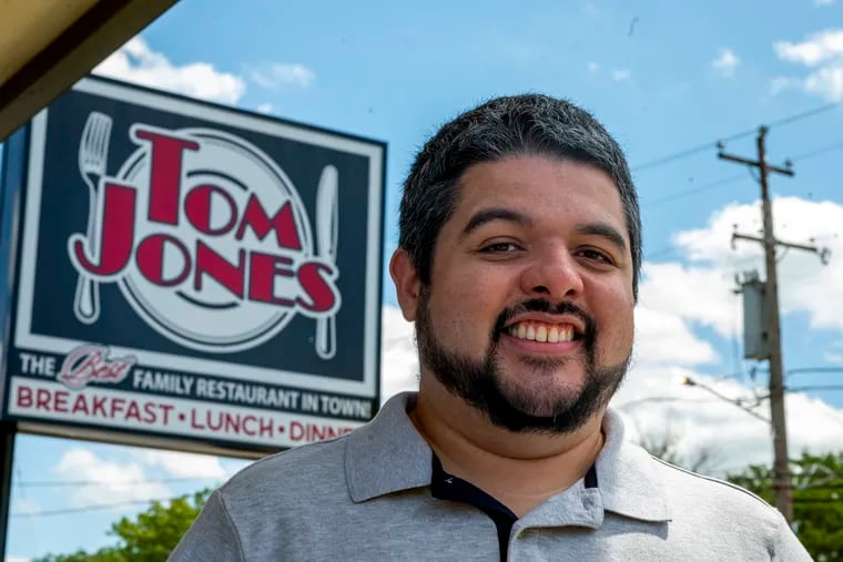 Delco native Chris Pierdomenico poses outside the Tom Jones Family Restaurant in Brookhaven. He'll shoot a scene for his film, "Delco: The Movie" at the restaurant.