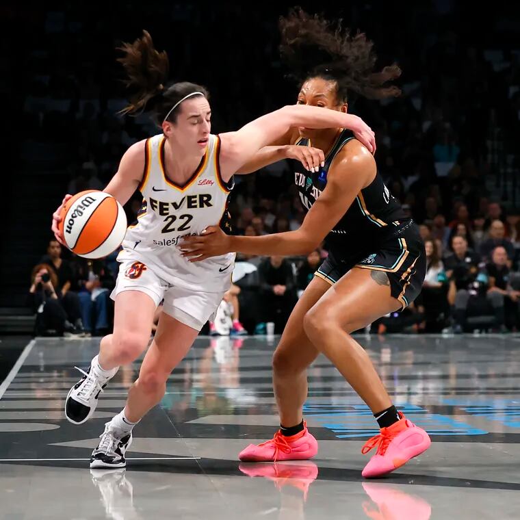 Caitlin Clark (left) has faced tough defense from New York's Betnijah Laney-Hamilton in two of her first three pro games.