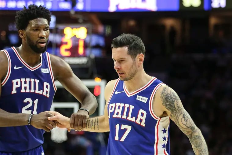 Joel Embiid and JJ Redick (17), two of the Sixers who won't play in the regular-season finale.