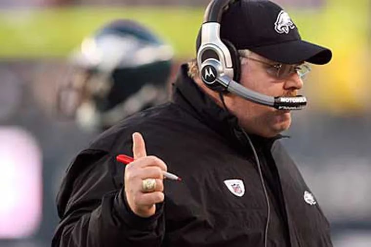 Andy Reid signals to the bench during the Eagles loss to the Cowboys. (Yong Kim / Staff Photographer)