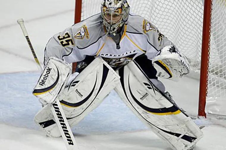 Pekka Rinne is second in the NHL in goals-against average (2.10) and save percentage (.929). (Lynne Sladky/AP Photo)