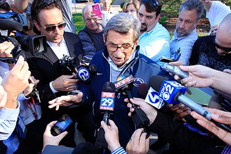 Joe Paterno answered a few questions from reporters before leaving for practice today. (David Swanson/Staff Photographer)
