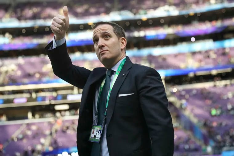 Eagles GM Howie Roseman gives a thumbs up before the start of Super Bowl LLII, but he deserves a thumbs down for his mismanagement of Carson Wentz.