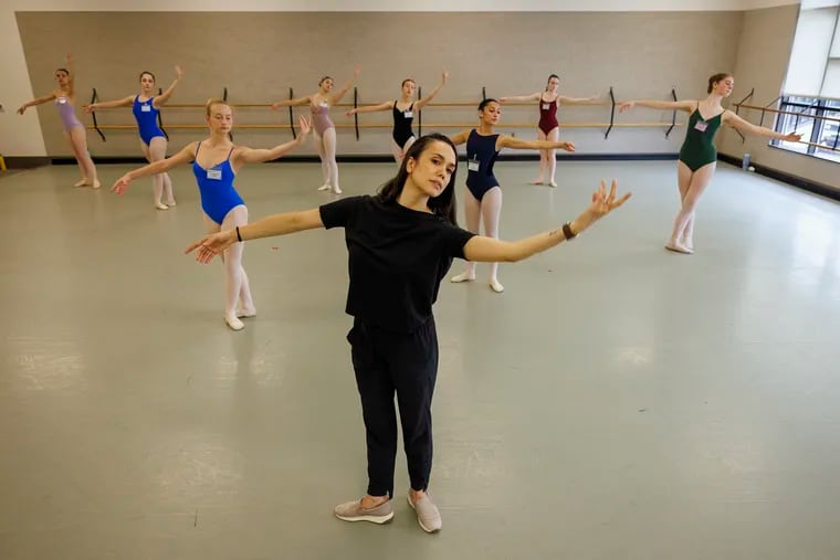 Noelani Pantastico, artistic director of the Central Pennsylvania Youth Ballet, demonstrates a port de bras for students in the Central Pennsylvania Youth Ballet's summer intensive.