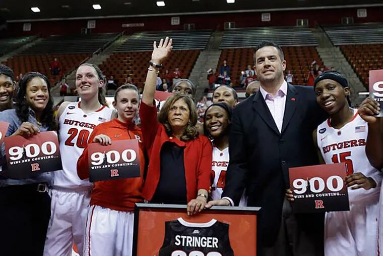 C. Vivian Stringer became the fourth women's college basketball coach to reach 900 wins as Rutgers cruised past South Florida, 68-56. (Mel Evans/AP)