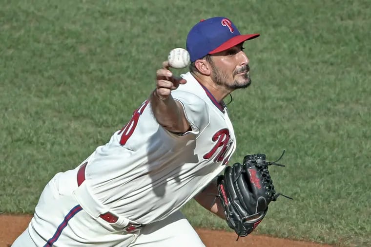 Phillies' pitcher Zach Eflin throws against the Red Sox  during the first game of a doubleheader.