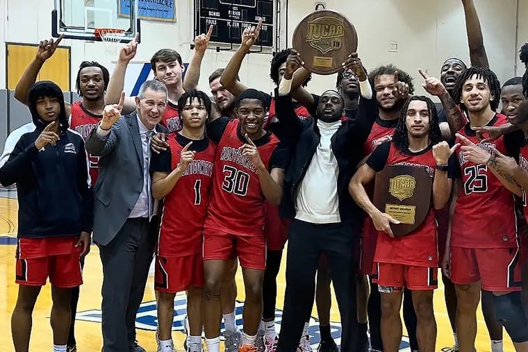The Montgomery County Community College men’s basketball team poses after winning the Region 19 championship on March 2.