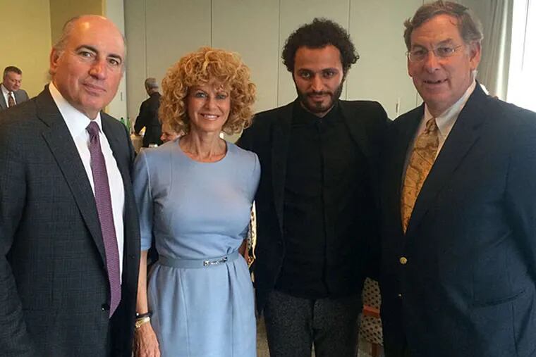 Businessman Cosmo DeNicola (left) was joined by fellow Philadelphians Sharon Pinkenson, of the city's film office, and Sam Katz (right) for a luncheon at the United Nations honoring Iraqi director Yasir Kareem (second from right).