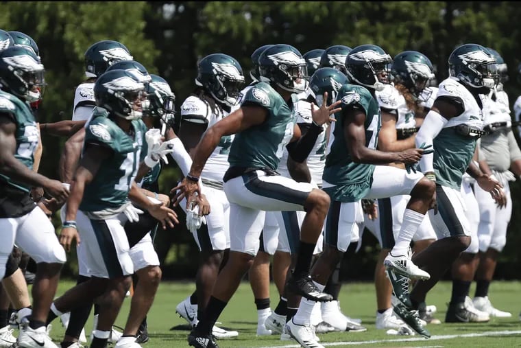 The Eagles warm up before a practice.