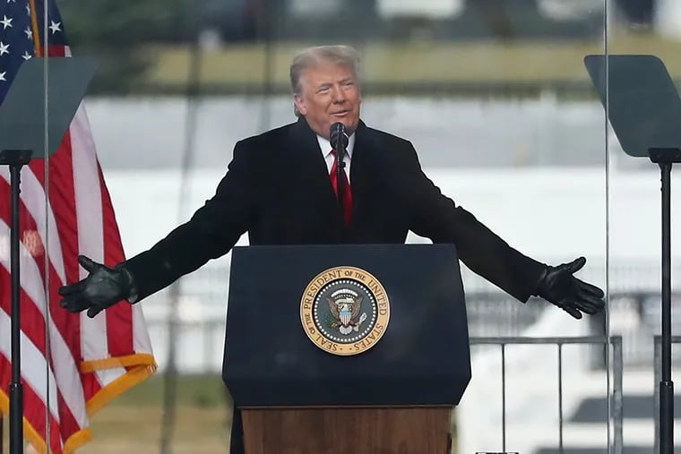 President Donald Trump gestures while speaking to the crowd during a “Save America” rally in Washington on Wednesday. before his supporters attacked the Capitol.