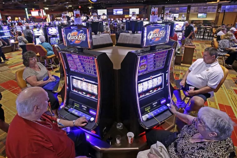 Casino patrons play some of the 600 slot machines at the Lady Luck Casino Nemacolin in July 2013. The Pennsylvania legislature last month passed a massive gambling expansion bill that contains special protections for just one politically connected casino: Mount Airy Casino Resort in the Pocons.