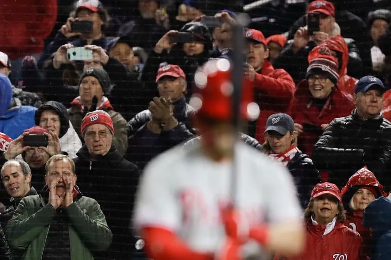 Fans react watching Phillies Bryce Harper bat during the first-inning against the Washington Nationals on Tuesday, April 2, 2019 in Washington D.C.