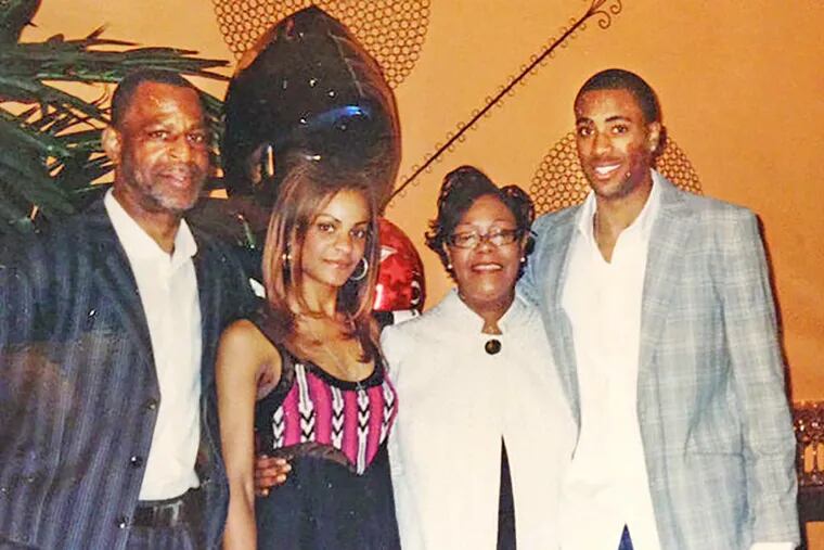 Wayne Ellington Sr. (left), the father of Los Angeles Lakers guard Wayne Ellington Jr. (far right) in a family photo with two of his three children and his wife. The older Ellington was found shot in the head in his car in Germantown. Police have arrested one person. (family photo)