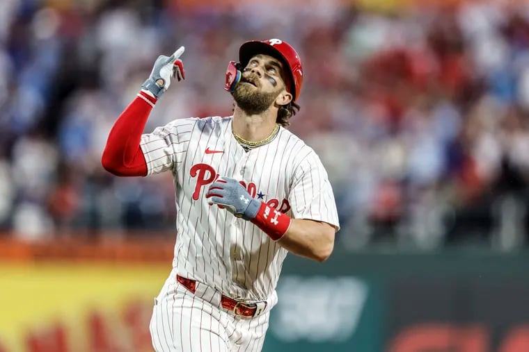 Phillies Bryce Harper rounds third base as he celebrates his solo home run against the  Rangers during the 6th inning at Citizens Bank Park in Philadelphia, Tuesday, May 21, 2024