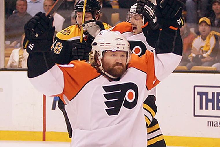 Scott Hartnell celebrates the Flyers first period goal. Ville Leino was later credited with the score.  (Yong Kim / Staff Photographer)