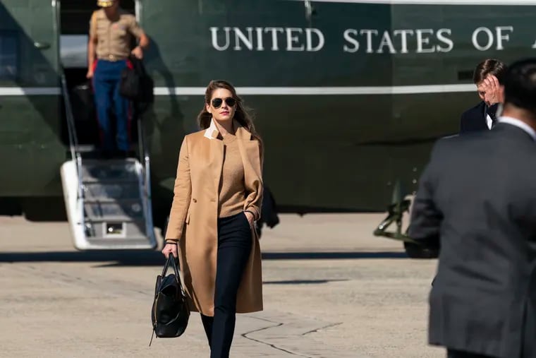 Counselor to the President Hope Hicks walks from Marine One to accompany President Donald Trump aboard Air Force One as he departs Wednesday, Sept. 30, 2020, at Andrews Air Force Base, Md.