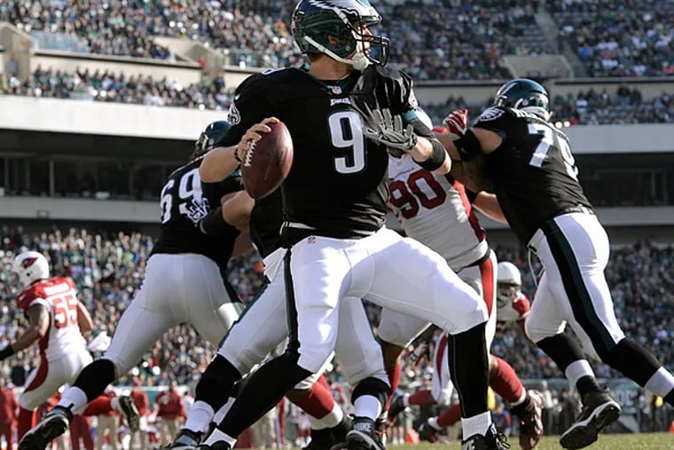 Eagles quarterback Nick Foles looks to pass during the first half against the Arizona Cardinals. (Michael Perez/AP)