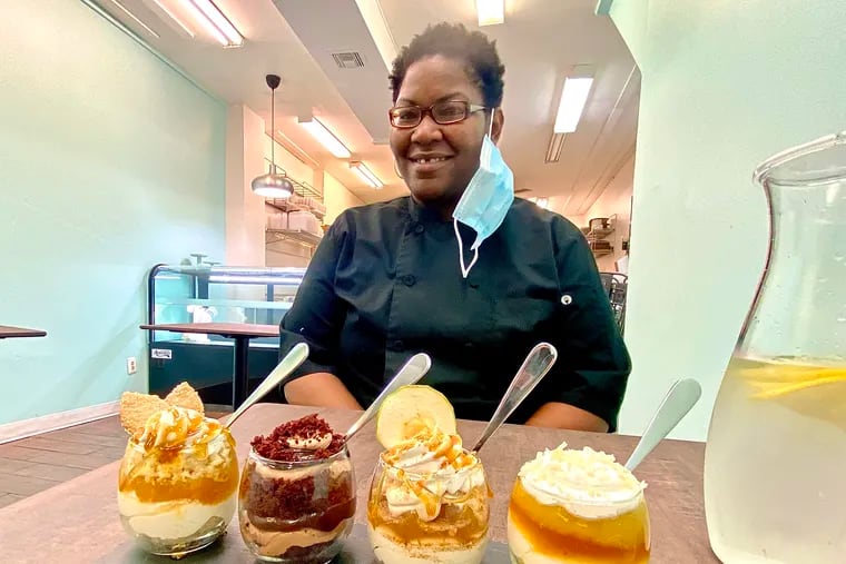 Tatiana Wingate at her pastry shop, Sprinkled Sweetness, with desserts served in a glass. From left: peach cobbler, chocolate ganache, caramel apple crumb, and mango pina colada.