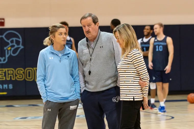From left, Steph Carideo, Herb Magee, and Kay Magee talk during a practice.