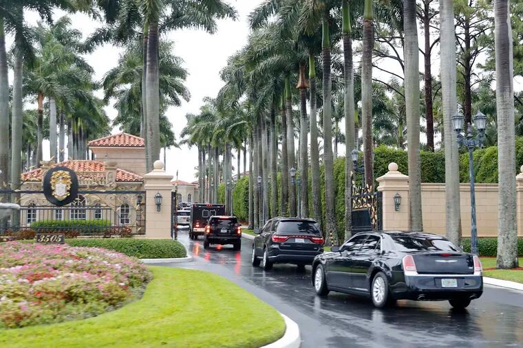 President Donald Trump and his accompanying motorcade vehicles arrive at Trump International Golf Club, Friday, April 19, 2019 in West Palm Beach, Fla.
