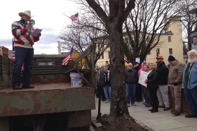 About 150 gun-rights advocates converged outside the Bucks County courthouse in Doylestown Saturday in support of the Second Amendment and to protest firearm restrictions. (Aubrey Whelan / Staff)