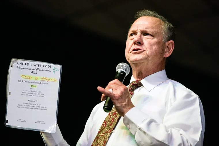 Republican senators on Thursday called on Roy Moore, seen here in a file photo in Florence, Ala., to withdraw from the Senate race in Alabama if allegations of sexual misconduct are true.