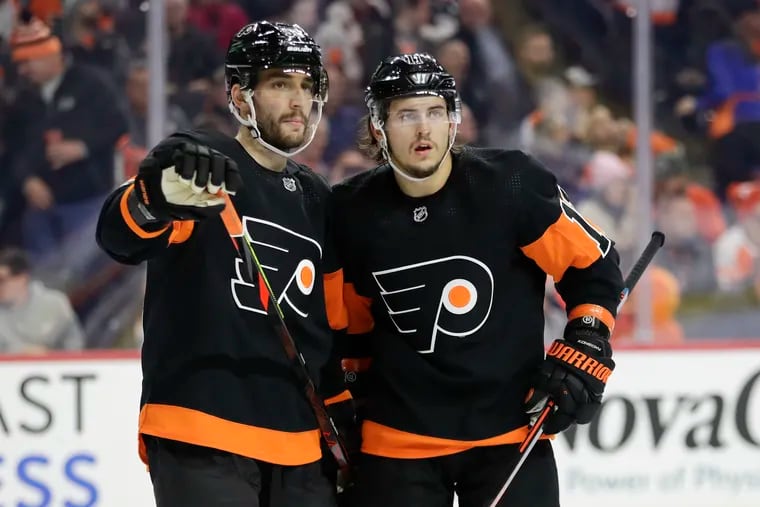 What gifts are recommended for multi-millionaire hockey players like Shayne Gostisbehere (left) and Travis Konecny of the Flyers?