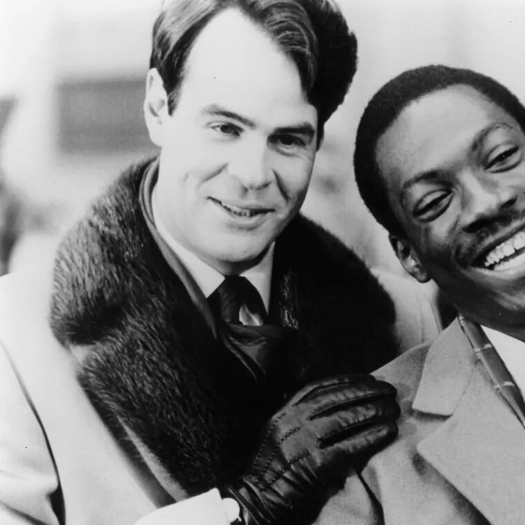 Dan Aykroyd as Louis Winthorpe III and Eddie Murphy as Billy ray Valentine in a scene from the film 'Trading Places', 1983.