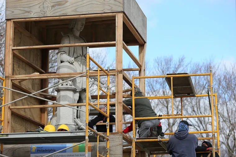 The box covering the Christopher Columbus statue in Marconi Plaza was temporarily removed for an inspection on Jan. 27.