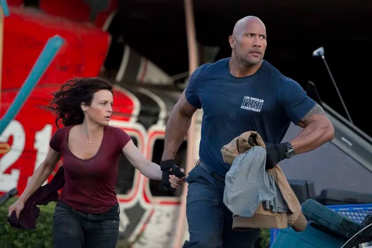 Dwayne Johnson and Carla Gugino portray Ray and Emma Gaines, fleeing rumbling trouble in &quot;San Andreas.&quot;