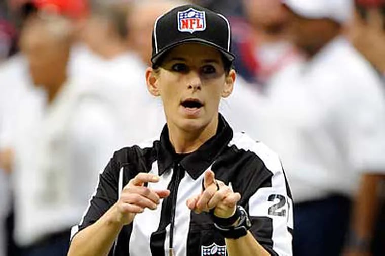 Shannon Eastin became the first female official in the NFL. (Dave Einsel/AP)