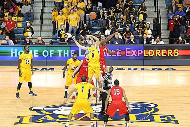 The opening tip-off between La Salle and Hartford at Tom Gola Arena. (Yong Kim/Staff Photographer)