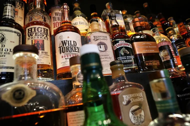 The shelves at Gamlin Whiskey House in the Central West End of St. Louis are stocked with hundreds of bottles of whiskey.
