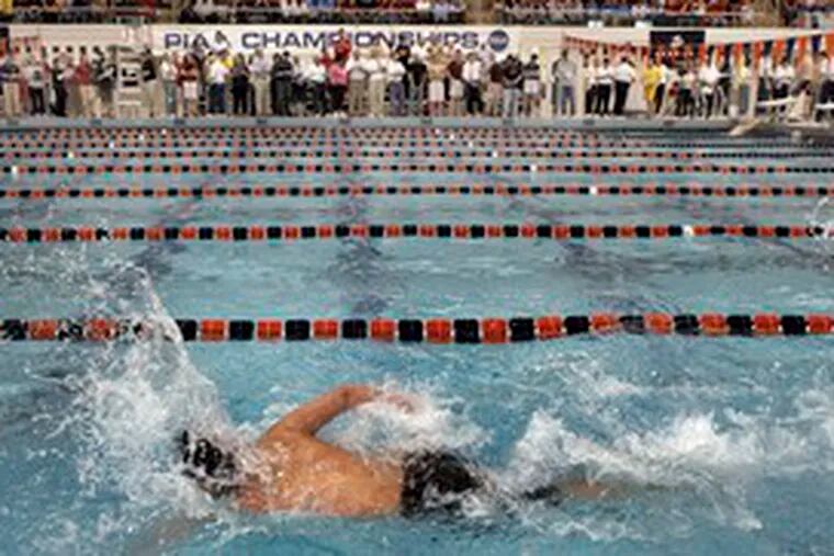 Ron Jay Santiago swimming the last lap of the relay during the state meet at Bucknell University.