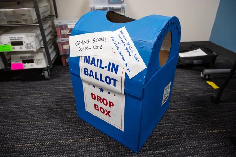A mock ballot box previously used as a "dancing ballot box" costume that was found at a Bucks County borough hall. Six people cast their ballots in the mock drop box.
