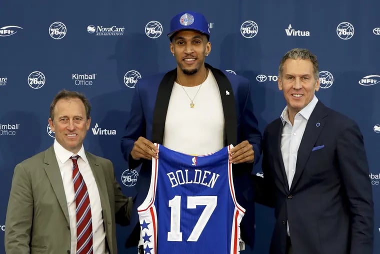 Jonah Bolden was picked by former team executive Bryan Colangelo (right) and co-managing partner Josh Harris (left) in the 2017 draft but spent the season playing overseas.