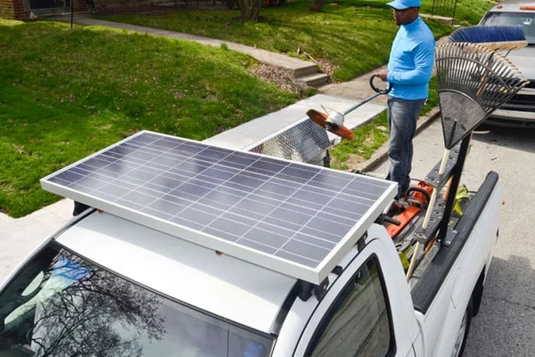 The 135-watt, 12-volt solar panel and an inverter charges mowers (except for ride-ons), trimmers, and blowers. (Ron Tarver / Staff Photographer)