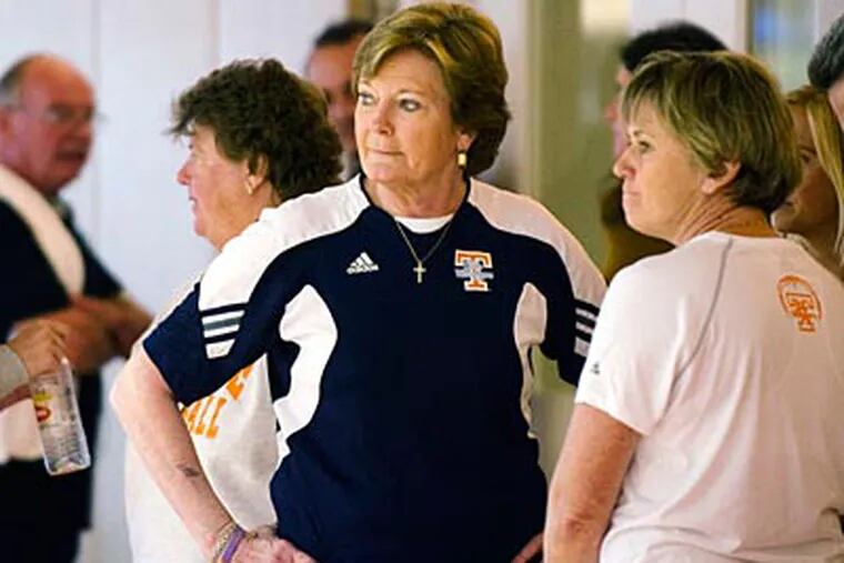Pat Summitt and associate head coach Holly Warlick watch after a Volunteers practice on Saturday. (Saul Young/Knoxville News Sentinel)